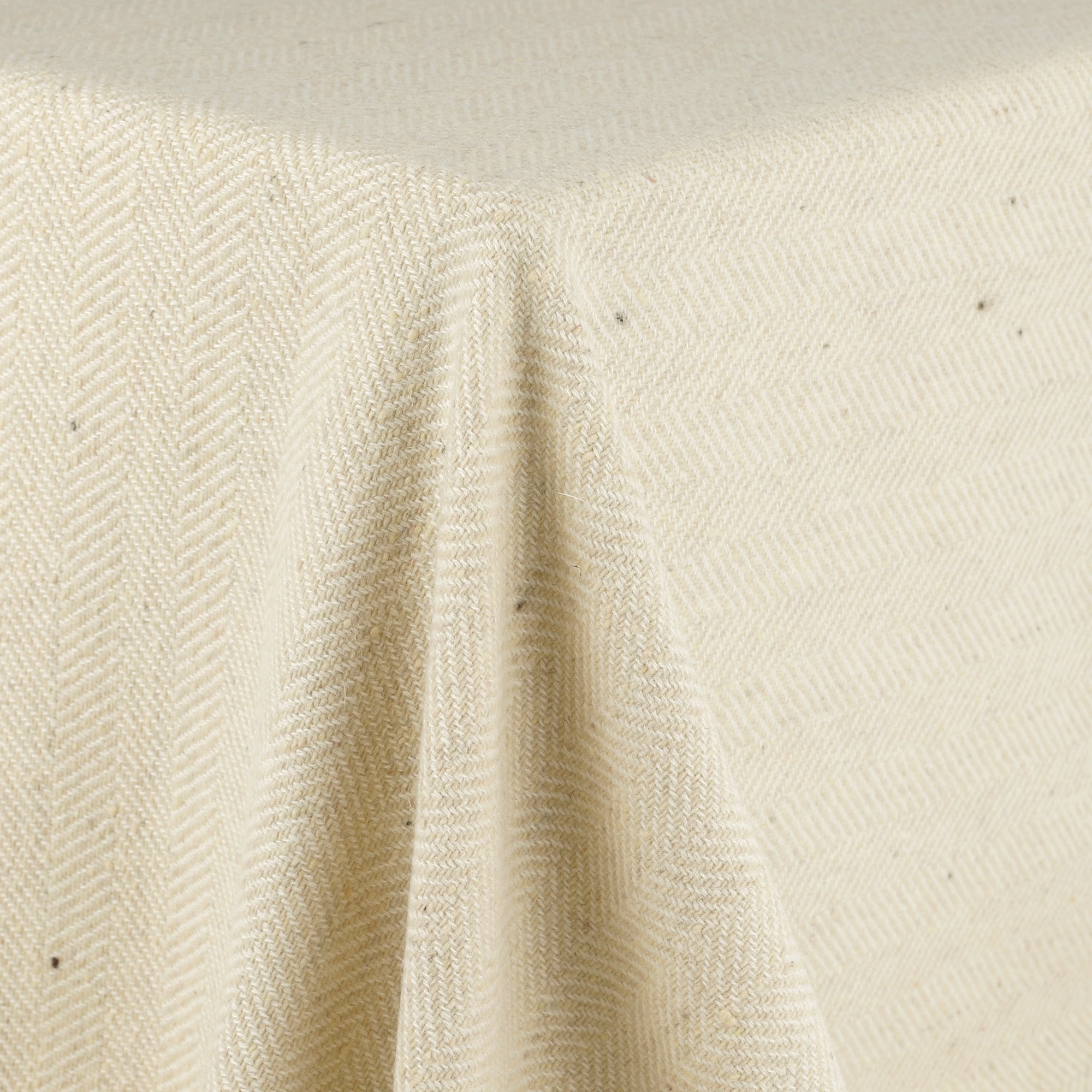 Herringbone_Wool_Coating_Natural_Drape.jpg
